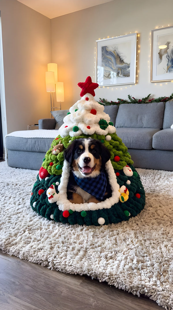 Chien dans la maison sapin de Noël